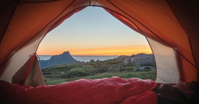 A view of a western high desert from an open tent.