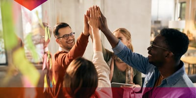 Team members high-fiving