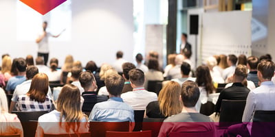 Speaker in front of an audience