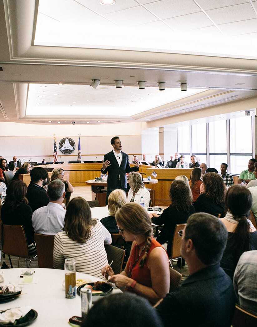 Ryan Estis speaking on stage