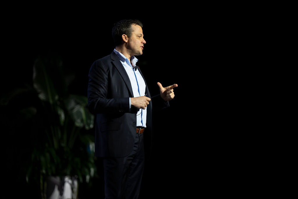 Ryan Estis delivering a keynote on stage