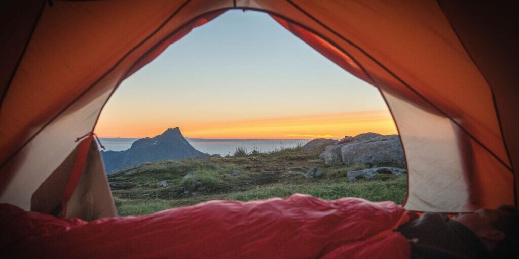 A view of a western high desert from an open tent.