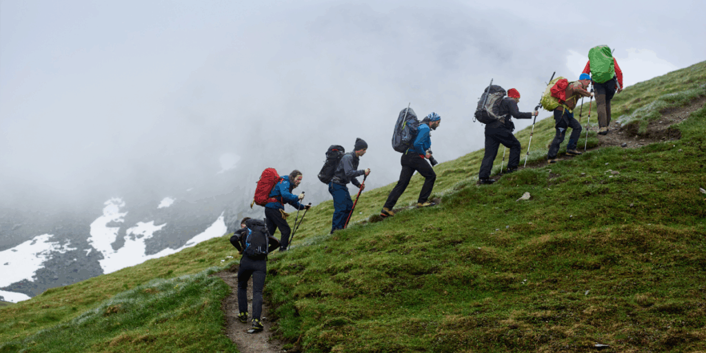 Group climbing a hill together